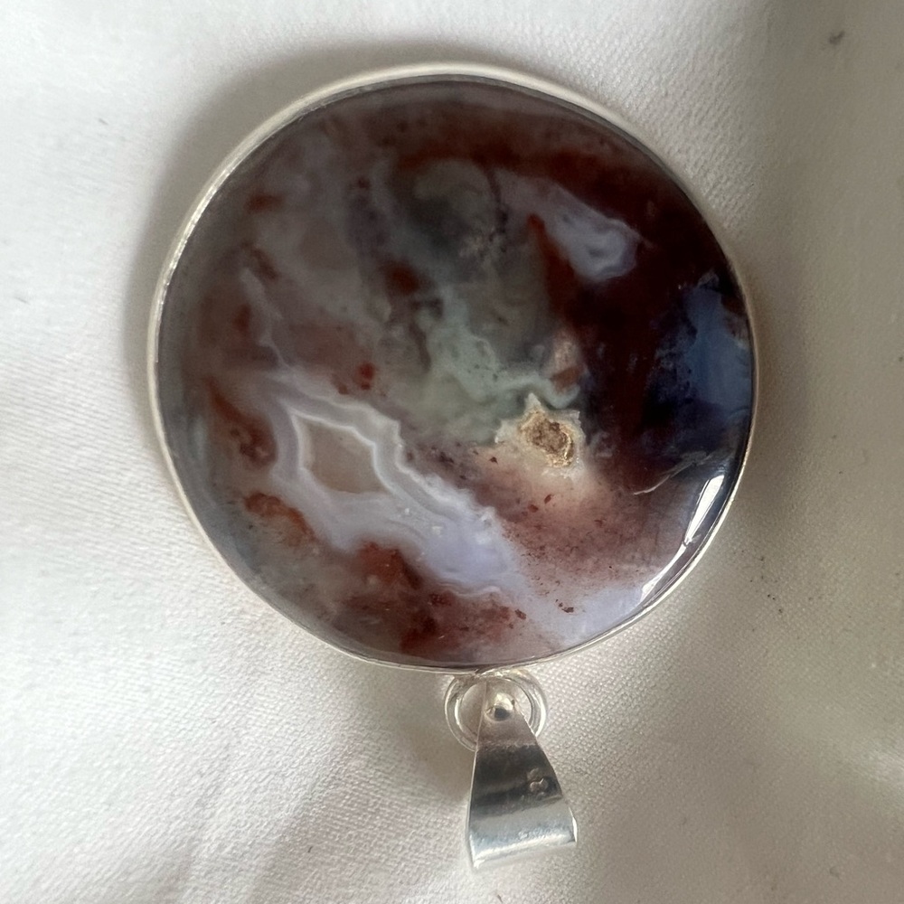 Elegant Silver and Brown Pendant
